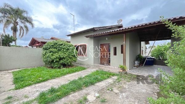 Casa à venda com 3 quartos, 80m², 2 vagas, Rua Bougainville no bairro Lageado em Porto Alegre