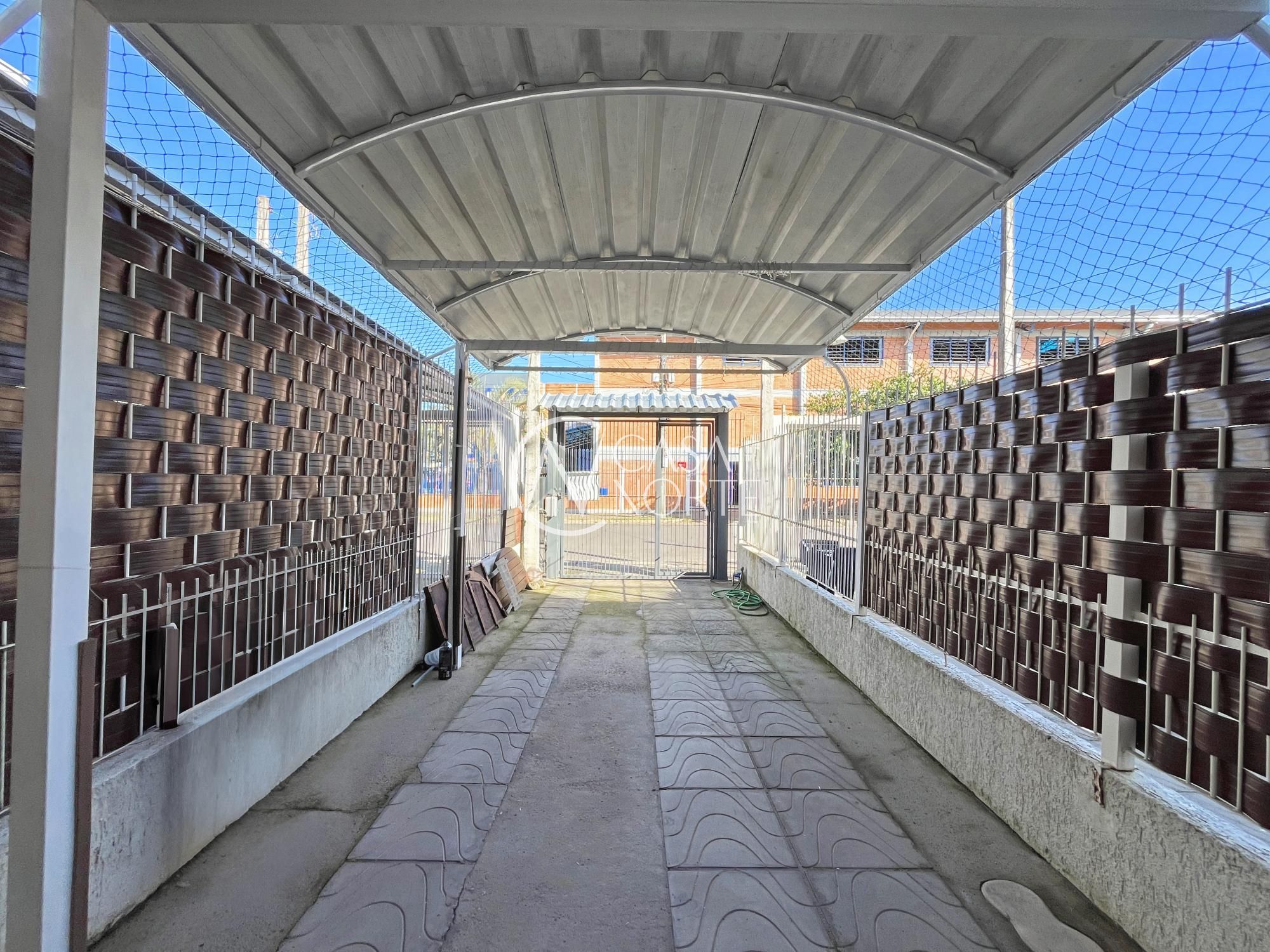 Casa à venda com 2 quartos, 82m², 2 suítes, 1 vaga, Rua Zuzu Angel no bairro Hípica em Porto Alegre