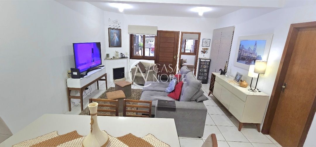 Casa à venda com 4 quartos, 104m², 2 vagas, Rua Alexandre de Gusmao no bairro Aberta dos Morros em Porto Alegre