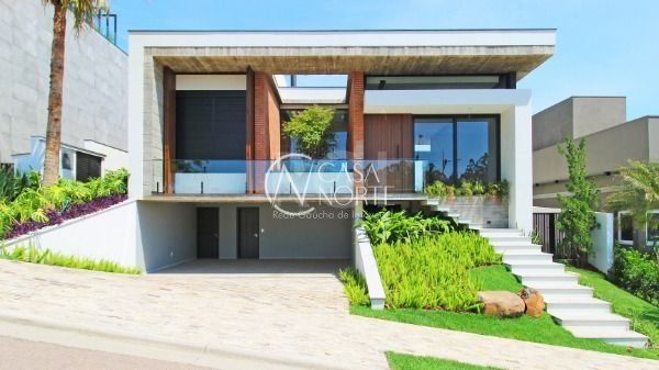 Casa de Condomínio à venda com 4 quartos, 300m², 4 suítes, 4 vagas, Estrada das Três Meninas no bairro Vila Nova em Porto Alegre