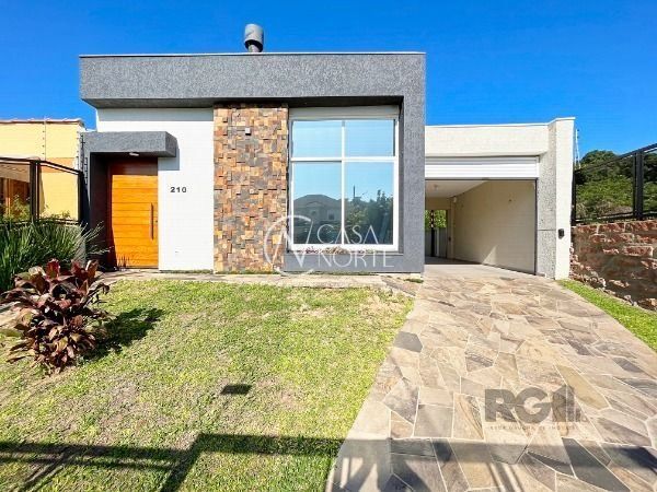 Casa à venda com 3 quartos, 155m², 3 suítes, 4 vagas, Rua Luiz Delfino no bairro Espírito Santo em Porto Alegre