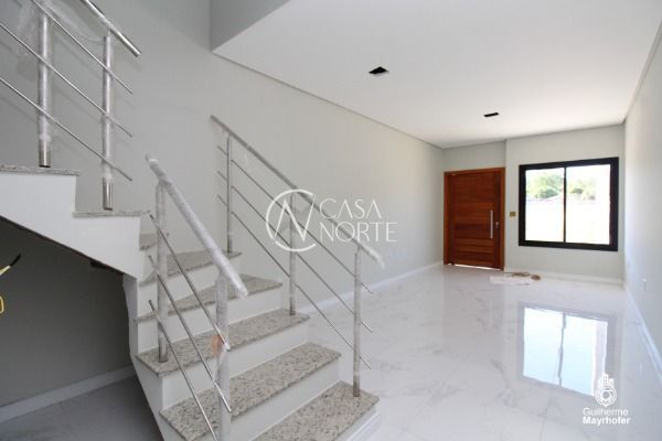 Casa à venda com 2 quartos, 107m², 2 suítes, 1 vaga, Affonso Lunardelli no bairro Hípica em Porto Alegre