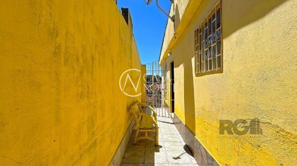 Casa à venda com 2 quartos, 140m², 1 vaga, Rua Tenente Ary Tarrago no bairro Jardim Itu em Porto Alegre