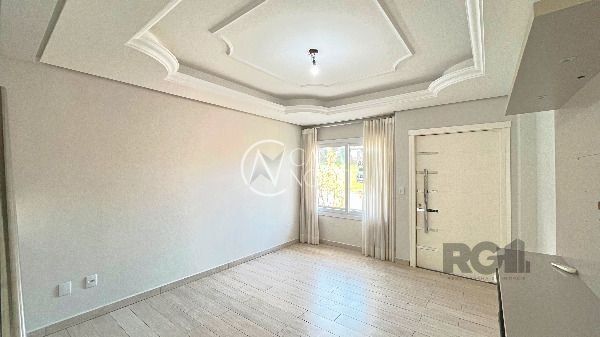 Casa à venda com 3 quartos, 166m², 3 suítes, 2 vagas, Rua Ivo Walter Kern no bairro Hípica em Porto Alegre