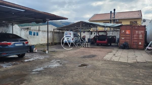 Terreno à venda  com 102m², Avenida Edgar Pires de Castro no bairro Hípica em Porto Alegre