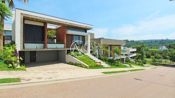 Casa de Condomínio à venda com 4 quartos, 300m², 4 suítes, 4 vagas, Estrada das Três Meninas no bairro Vila Nova em Porto Alegre