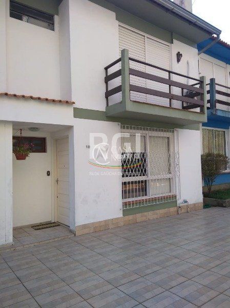 Casa de Condomínio à venda com 3 quartos, 156m², 1 suíte, 1 vaga, Rua Joaquim Cruz no bairro Santo Antônio em Porto Alegre