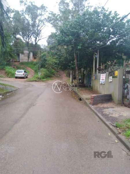 Casa à venda com 2 quartos, 80m², 1 vaga, Rua Stringhini no bairro Hípica em Porto Alegre