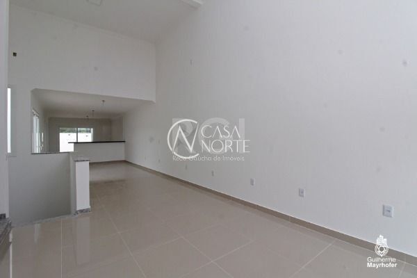 Casa à venda com 3 quartos, 196m², 1 suíte, 2 vagas, Rua Affonso Lunardelli no bairro Hípica em Porto Alegre