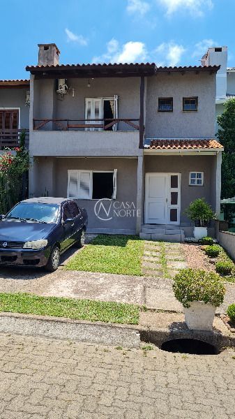 Casa à venda com 3 quartos, 177m², 1 suíte, 2 vagas, Rua Roberto Santini no bairro Hípica em Porto Alegre