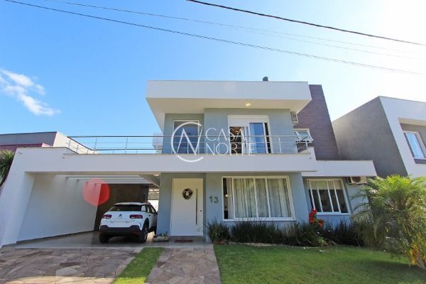 Casa à venda com 5 quartos, 236m², 4 suítes, 2 vagas, Rua Ivo Walter Kern no bairro Hípica em Porto Alegre
