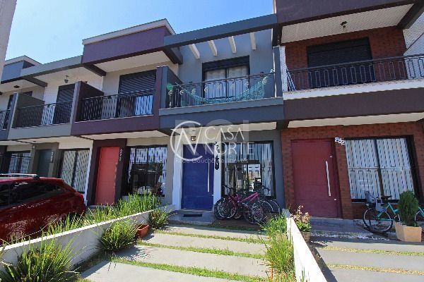 Casa à venda com 2 quartos, 111m², 2 suítes, 1 vaga, Rua Irany de Oliveira Santanna no bairro Hípica em Porto Alegre