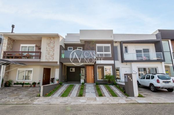 Casa de Condomínio à venda com 3 quartos, 153m², 1 suíte, 2 vagas, Rua Jorge Babot Miranda no bairro Aberta dos Morros em Porto Alegre