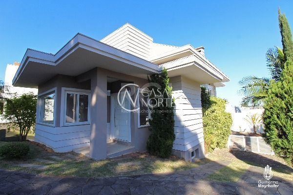 Casa de Condomínio à venda com 3 quartos, 280m², 1 suíte, 5 vagas, Rua Francisco Solano Borges no bairro Aberta dos Morros em Porto Alegre