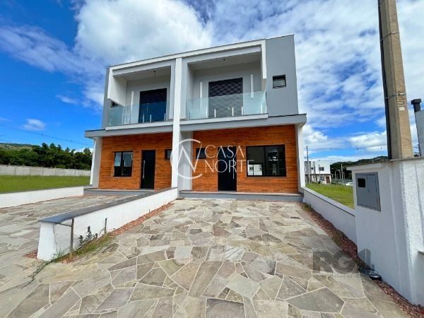 Casa de Condomínio à venda com 3 quartos, 115m², 1 suíte, 2 vagas, Estrada Jorge Pereira Nunes no bairro Campo Novo em Porto Alegre