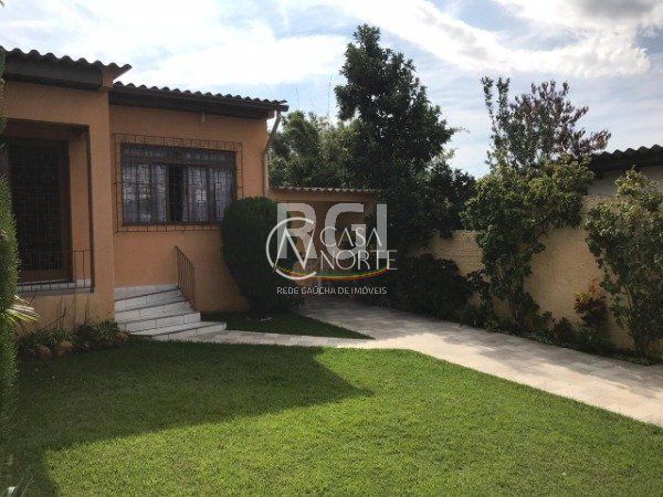 Casa à venda com 3 quartos, 150m², 2 vagas, Rua Atilio Supertti no bairro Vila Nova em Porto Alegre