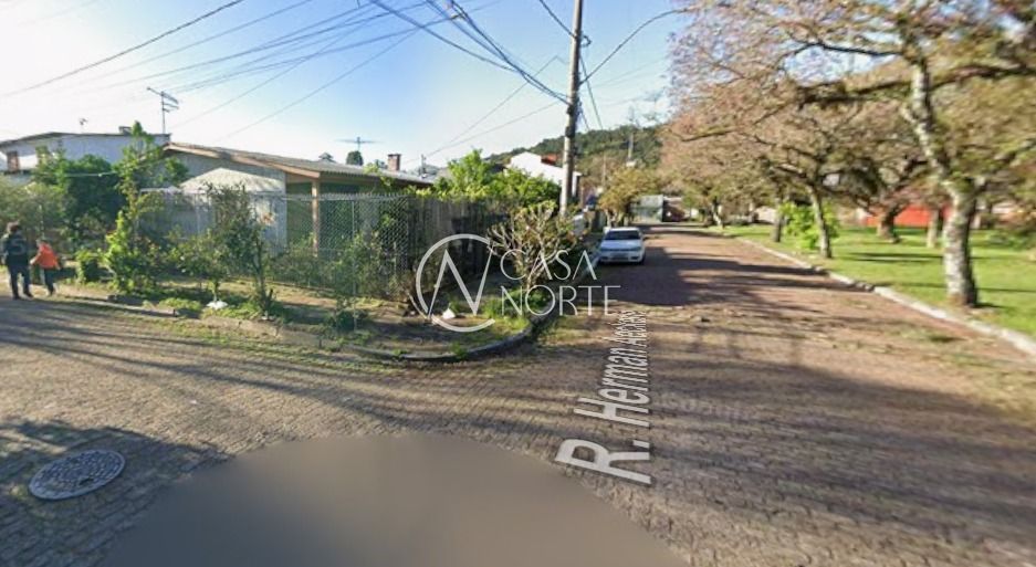 Casa à venda com 3 quartos, 149m², 1 suíte, 2 vagas, Rua Hermann Aeckerle no bairro Aberta dos Morros em Porto Alegre