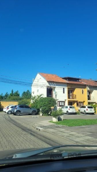 Casa de Condomínio à venda com 2 quartos, 122m², 1 vaga, Avenida Edgar Pires de Castro no bairro Hípica em Porto Alegre
