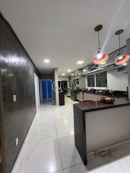 Casa à venda com 5 quartos, 513m², 1 suíte, 4 vagas, Avenida João Antônio Silveira no bairro Lomba do Pinheiro em Porto Alegre