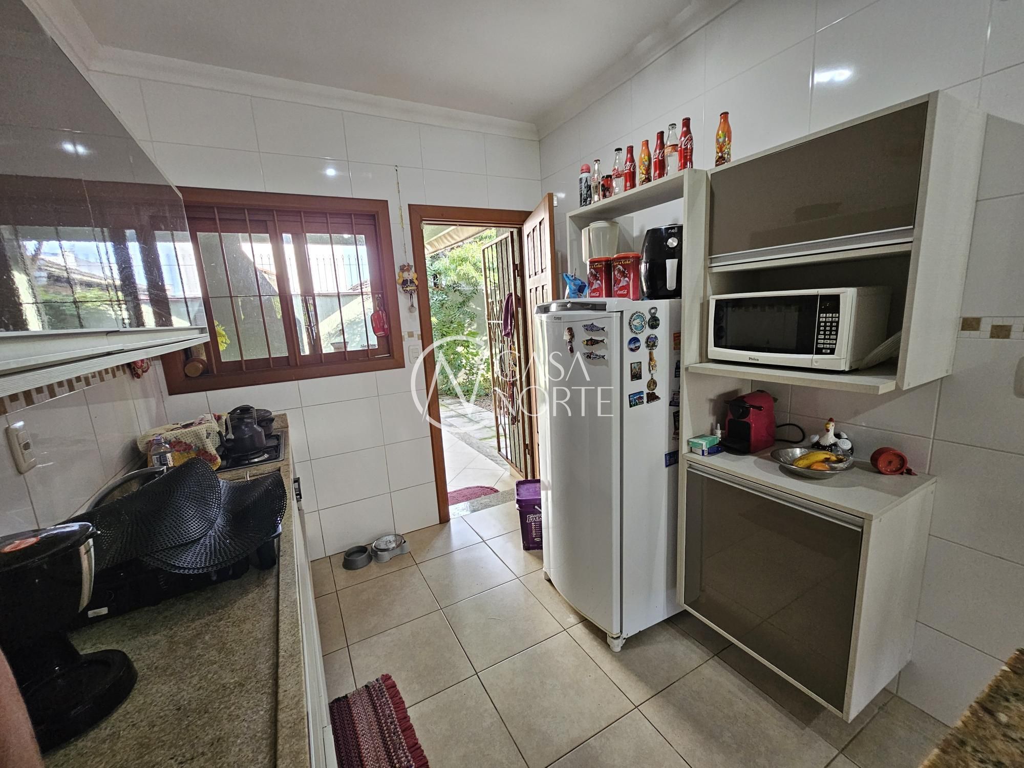 Casa à venda com 3 quartos, 114m², 1 suíte, 2 vagas, Rua Heitor Kramer no bairro Guarujá em Porto Alegre