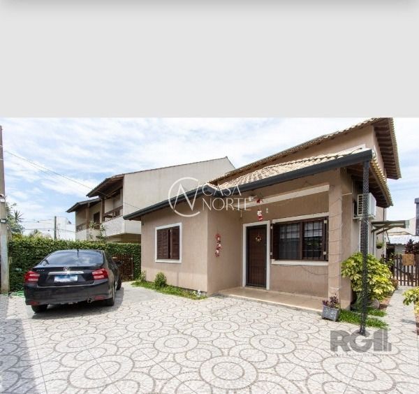 Casa à venda com 5 quartos, 152m², 1 suíte, 2 vagas, Rua Luzinete Alves Aragon no bairro Aberta dos Morros em Porto Alegre