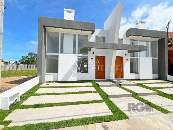 Casa de Condomínio à venda com 3 quartos, 91m², 1 suíte, 2 vagas, Rua Lucindo Antônio Bottin no bairro Hípica em Porto Alegre