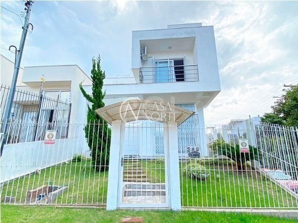 Casa à venda com 3 quartos, 208m², 1 suíte, 2 vagas, Avenida Altos do Santa Rita no bairro Aberta dos Morros em Porto Alegre