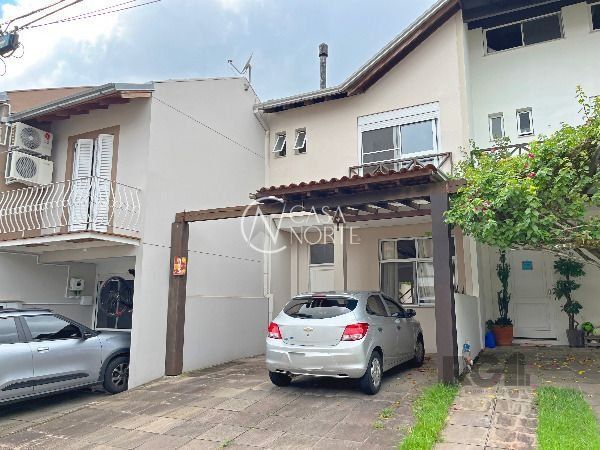 Casa de Condomínio à venda com 3 quartos, 159m², 1 suíte, 2 vagas, Estrada João Salomoni no bairro Vila Nova em Porto Alegre