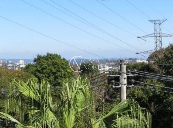 Casa à venda com 4 quartos, 356m², 2 suítes, 4 vagas, Avenida Fabio Araujo Santos no bairro Nonoai em Porto Alegre