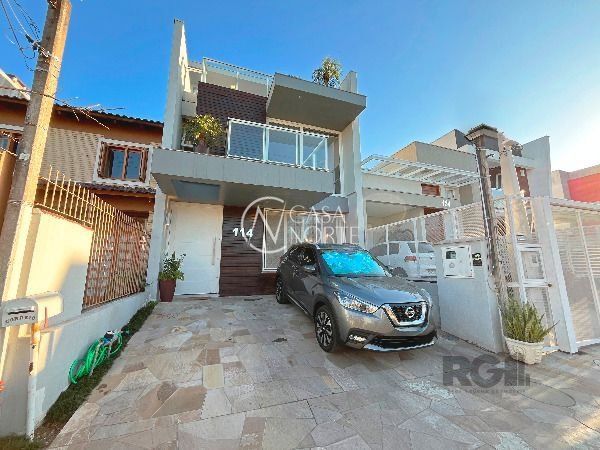 Casa à venda com 3 quartos, 186m², 1 suíte, 2 vagas, Rua Aldo Sani no bairro Hípica em Porto Alegre
