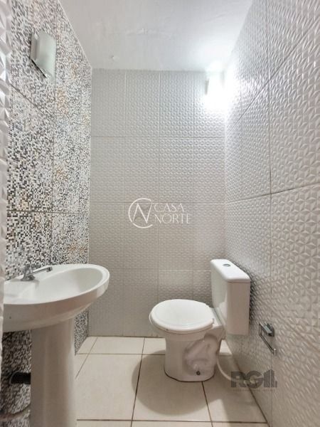 Casa à venda com 3 quartos, 123m², 1 suíte, 4 vagas, Rua José Matone no bairro Aberta dos Morros em Porto Alegre