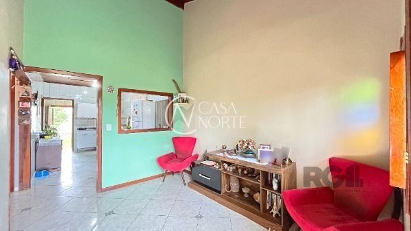 Casa à venda com 3 quartos, 80m², 2 vagas, Rua Bougainville no bairro Lageado em Porto Alegre