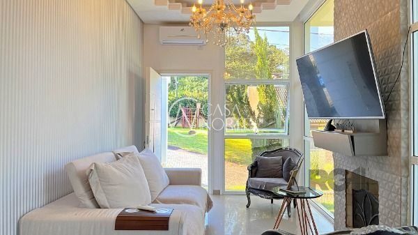 Casa de Condomínio à venda com 3 quartos, 184m², 1 suíte, 2 vagas, Avenida Juca Batista no bairro Aberta dos Morros em Porto Alegre