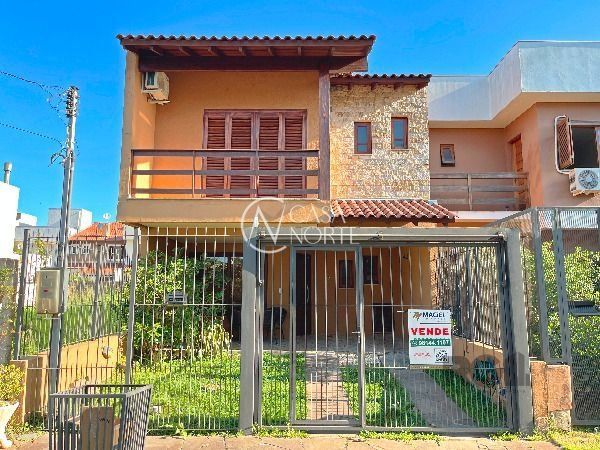 Casa à venda com 3 quartos, 130m², 1 suíte, 2 vagas, Rua Irany de Oliveira Santanna no bairro Hípica em Porto Alegre