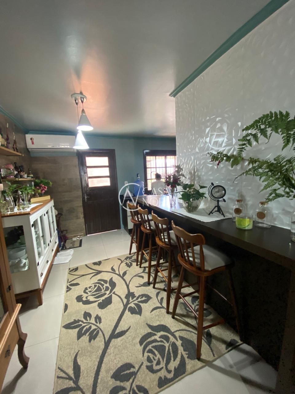 Casa à venda com 3 quartos, 140m², 2 vagas, Rua Silvestre Sauter no bairro Hípica em Porto Alegre