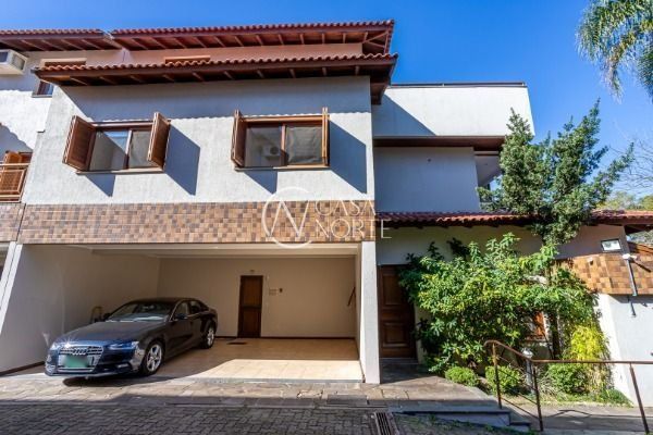 Casa de Condomínio à venda com 3 quartos, 367m², 1 suíte, 2 vagas, Travessa Pedra Redonda no bairro Jardim Isabel em Porto Alegre