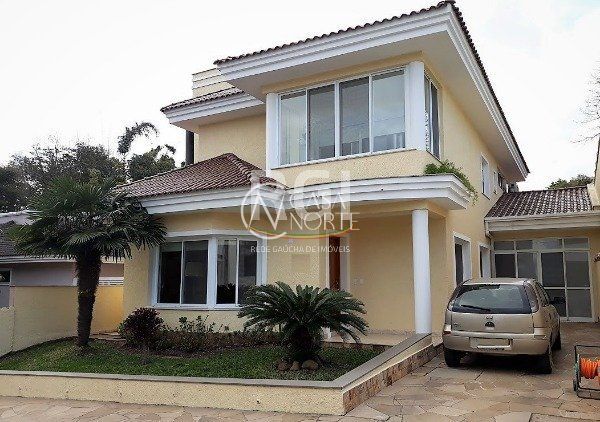 Casa de Condomínio à venda com 4 quartos, 283m², 3 suítes, 3 vagas, Rua Francisco Solano Borges no bairro Hípica em Porto Alegre