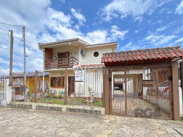 Casa à venda com 3 quartos, 207m², Rua Doutor Hermes Pacheco no bairro Aberta dos Morros em Porto Alegre