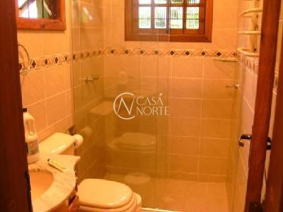 Casa à venda com 3 quartos, 258m², 3 suítes, 2 vagas, Engenheiro Tito Marques Fernandes no bairro Ipanema em Porto Alegre