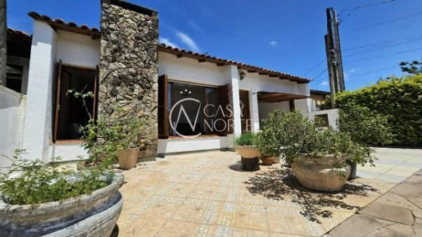 Casa de Condomínio à venda com 3 quartos, 110m², 1 suíte, 1 vaga, Avenida Edgar Pires de Castro no bairro Hípica em Porto Alegre