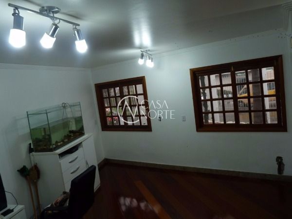 Casa à venda com 3 quartos, 525m², 3 suítes, 4 vagas, Avenida Luiz Moschetti no bairro Vila João Pessoa em Porto Alegre