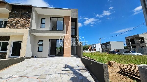 Casa de Condomínio à venda com 3 quartos, 143m², 1 suíte, 2 vagas, Estrada Jorge Pereira Nunes no bairro Campo Novo em Porto Alegre