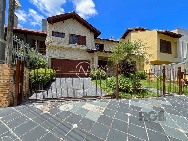 Casa à venda com 3 quartos, 340m², 3 suítes, 4 vagas, Rua Engenheiro Renato Costa Leite no bairro Ipanema em Porto Alegre