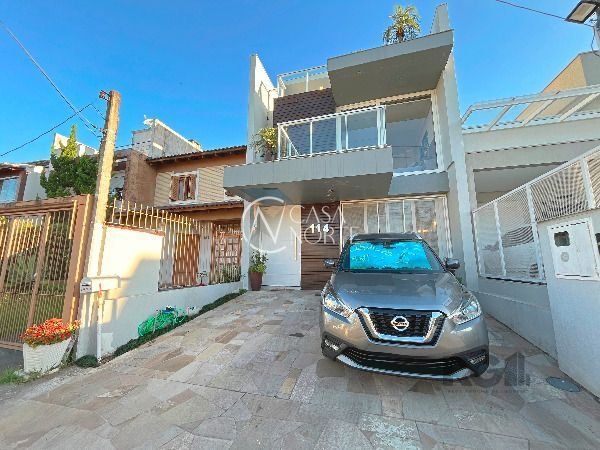 Casa à venda com 3 quartos, 186m², 1 suíte, 2 vagas, Rua Aldo Sani no bairro Hípica em Porto Alegre