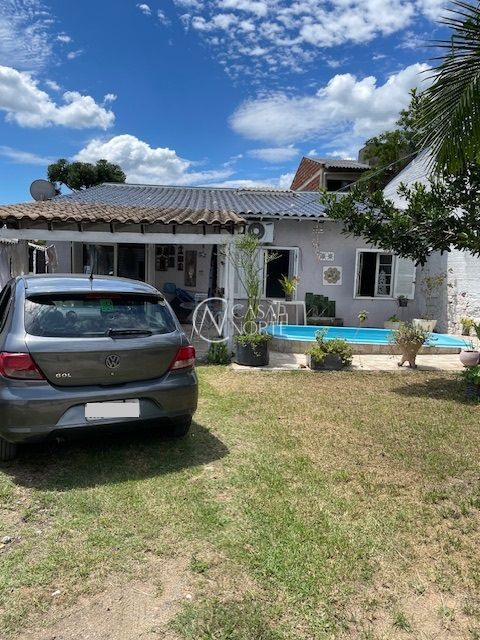 Casa à venda com 2 quartos, 80m², 3 vagas, Rua Morro Agudo no bairro Campo Novo em Porto Alegre