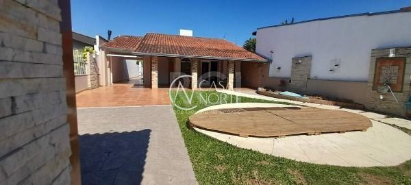 Casa à venda com 4 quartos, 374m², 1 suíte, 3 vagas, Rua Oiampi no bairro Guarujá em Porto Alegre