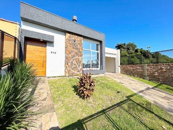 Casa à venda com 3 quartos, 155m², 3 suítes, 4 vagas, Rua Luiz Delfino no bairro Espírito Santo em Porto Alegre