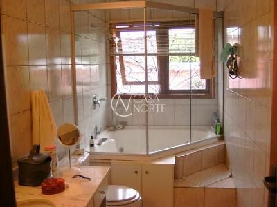 Casa à venda com 3 quartos, 258m², 3 suítes, 2 vagas, Engenheiro Tito Marques Fernandes no bairro Ipanema em Porto Alegre