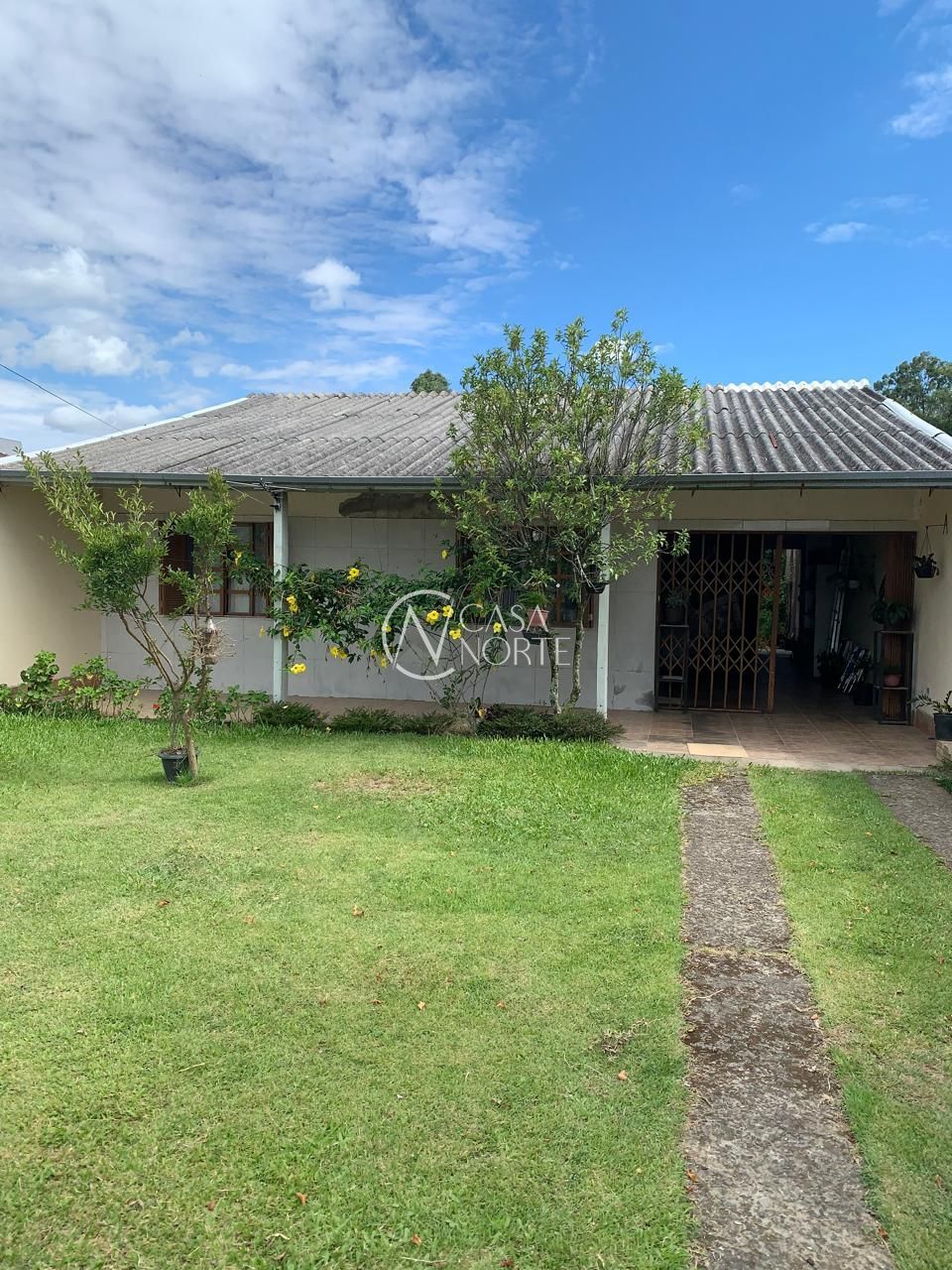 Casa à venda com 3 quartos, 100m², 3 vagas, Rua Ipê-Rosa no bairro Restinga em Porto Alegre