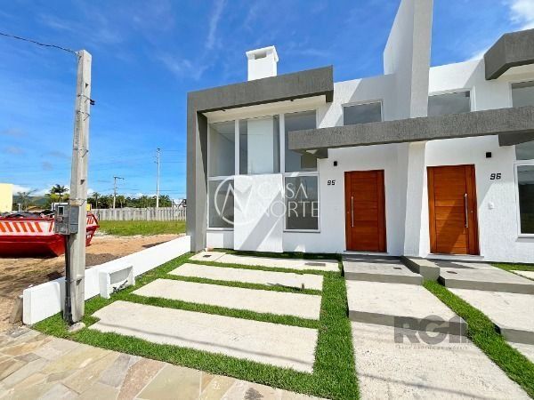 Casa de Condomínio à venda com 3 quartos, 91m², 1 suíte, 2 vagas, Rua Lucindo Antônio Bottin no bairro Hípica em Porto Alegre